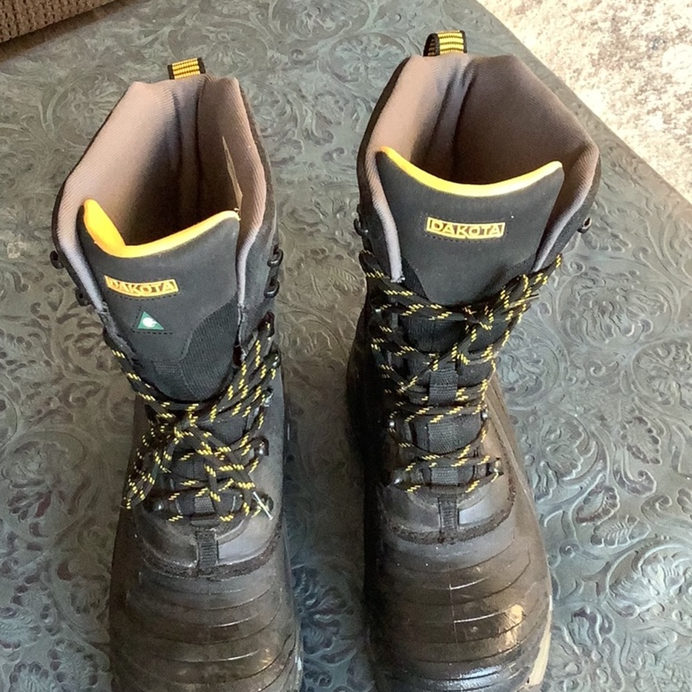 Dakota work boots. Traction on demand spiked. CSA approved.  Only worn twice.